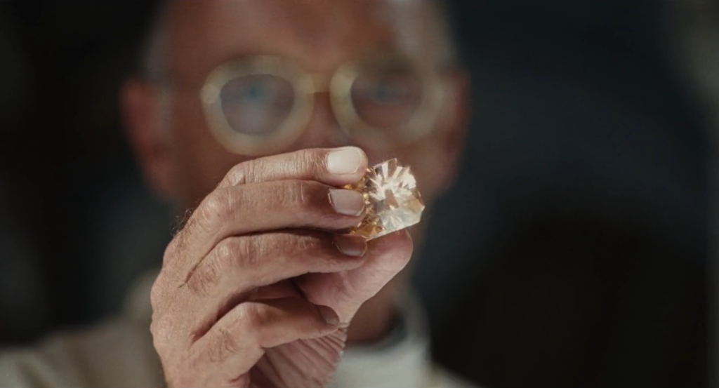 An image of Prentice holding Eve’s Apple.