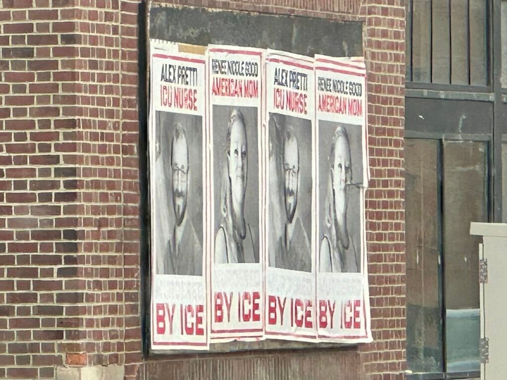 A photo of four posters side-by-side containing photos of Renee Nicole Good and Alex Pretti, with text stating "RENEE NICOLE GOOD - AMERICAN MOM - MURDERED BY ICE" and "ALEX PRETTI - ICU NURSE - MURDERED BY ICE"