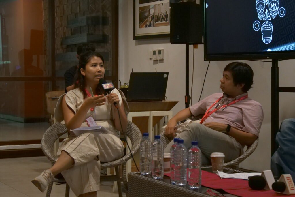 Two people in discussion about Southeast Asia Films